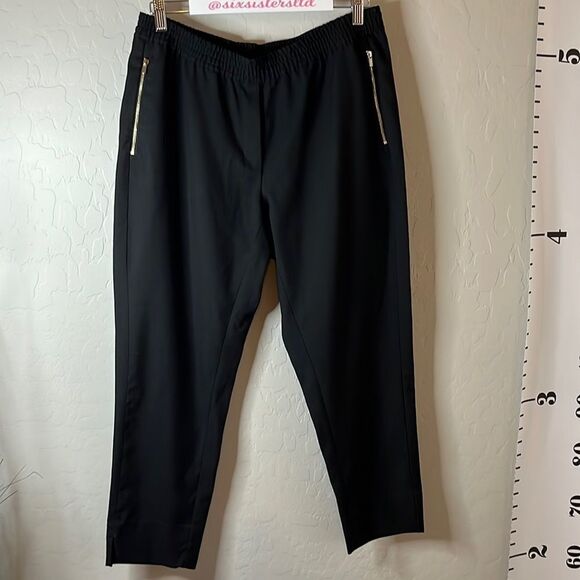 H&M black pull on trousers with zippered pockets. Size 14. Single back pocket. - Picture 1 of 9